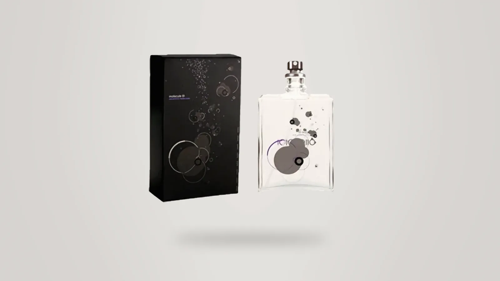 Our photo of Escentric Molecules Molecule 01 bottle and box on a light grey backdrop