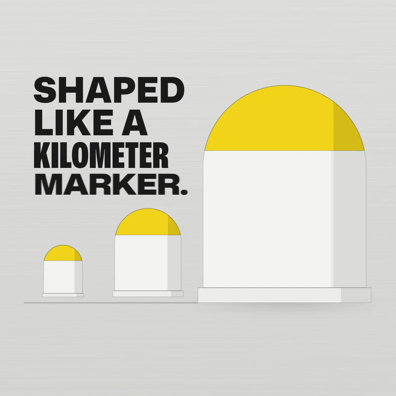 Our drawing from the Eau Facts video, not the real box: a white box with a rounded yellow top beside two smaller roadside markers, next to the words Shaped like a kilometer marker