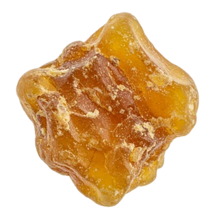 A single tear of olibanum, hardened frankincense resin, amber and translucent at its edges
